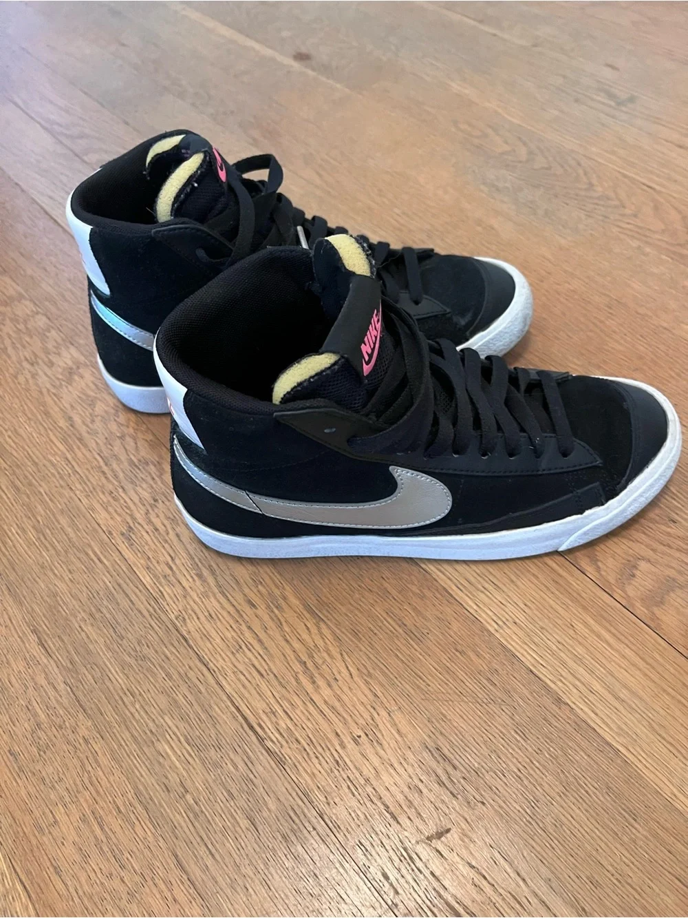 Nike Black High-Top Sneakers with White Sole and Pink Logo